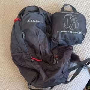 Eddie Bauer Black Stowaway Backpack with Red Accents